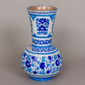 An Iznik Multan Sindh style pottery vase With elongated flared neck above the bulbous body,