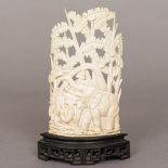 A late 19th/early 20th century Chinese ivory carving Worked with elephants amongst trees,