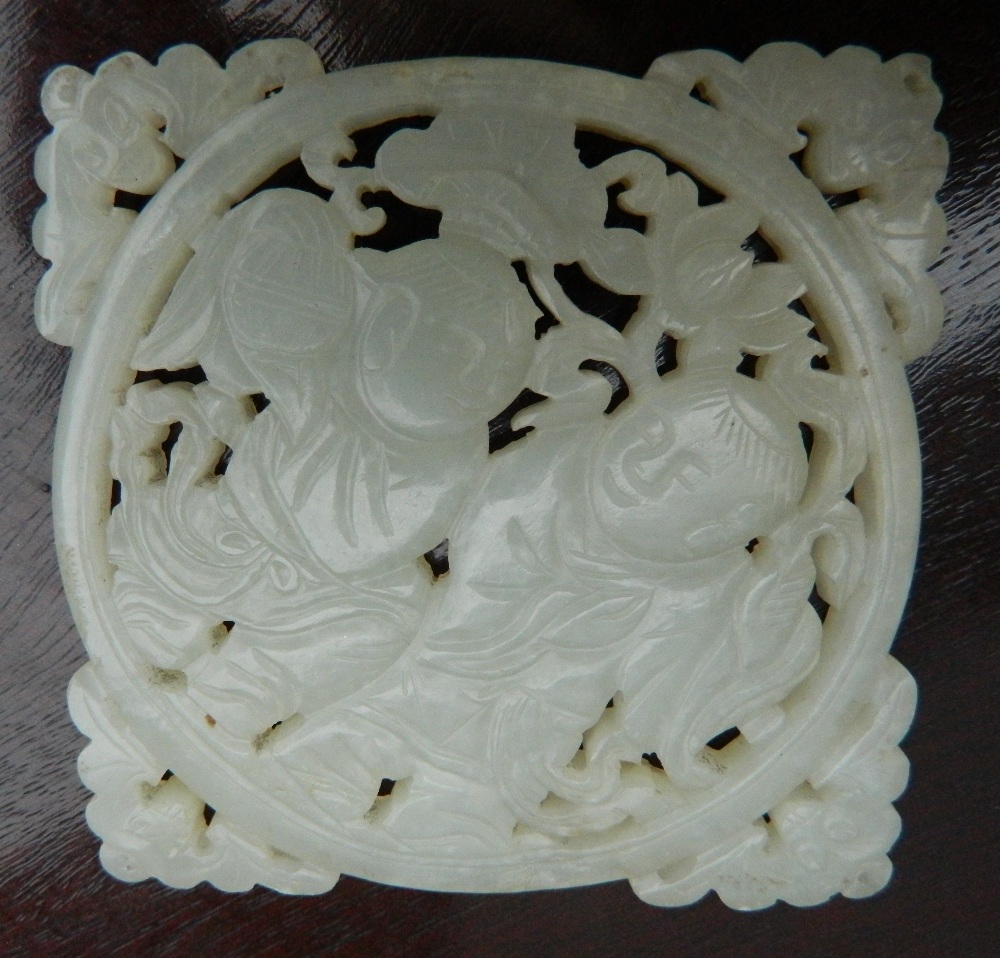 A Chinese pierced and carved jade roundel Centrally decorated with two young boys, - Image 9 of 13