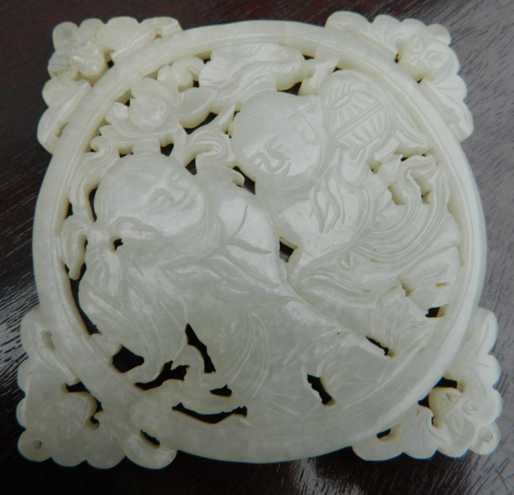 A Chinese pierced and carved jade roundel Centrally decorated with two young boys, - Image 8 of 13