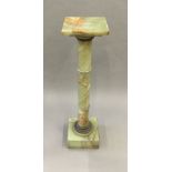 A late 19th century French gilt metal mounted green onyx column The square top supported on a
