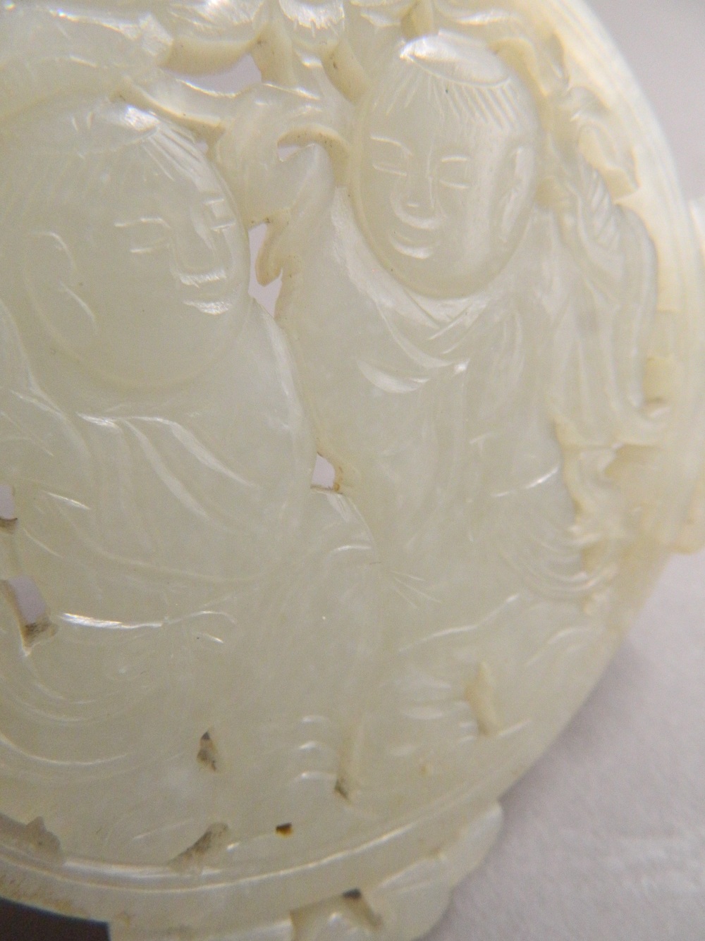 A Chinese pierced and carved jade roundel Centrally decorated with two young boys, - Image 5 of 13