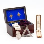 A 9 ct gold Masonic stick pin Set with a carved sardonyx intaglio,