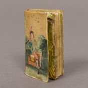 A 1771 London Almanac The painted cloth cover depicting a drummer before a castle. 5.5 cm high.