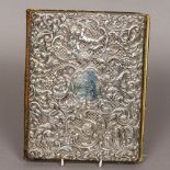 An Edwardian embossed silver mounted blotting pad, hallmarked London 1906,