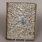An Edwardian embossed silver mounted blotting pad, hallmarked London 1906,