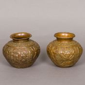 Two 19th century Indian copper lotas Of similar size, decorated with Hindu deities (Ganesh,