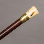 A late 19th century walking stick Set with shibayama inlaid ivory knop finial, signed. 93 cm long.