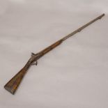 A 19th century flintlock rifle 137 cm long.