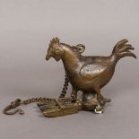 A 19th century Indian bronze hanging oil lamp Formed as a cockerel;