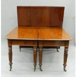 A 19th century eight-leg mahogany dining table,