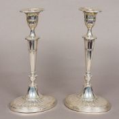 A pair of late Victorian silver candlesticks, hallmarked London 1898,