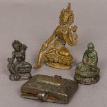 A coppery-bronze Tibetan figure of Buddha Together with two small Buddhas;