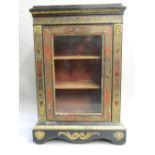 A 19th century Boulle pier cabinet The rectangular top above a frieze decorated with Vitruvian