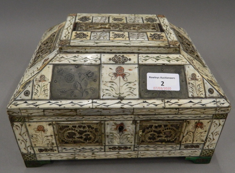 A 17th/18th century Continental bone clad casket The domed hinged lid set with carved bone panels - Image 2 of 9