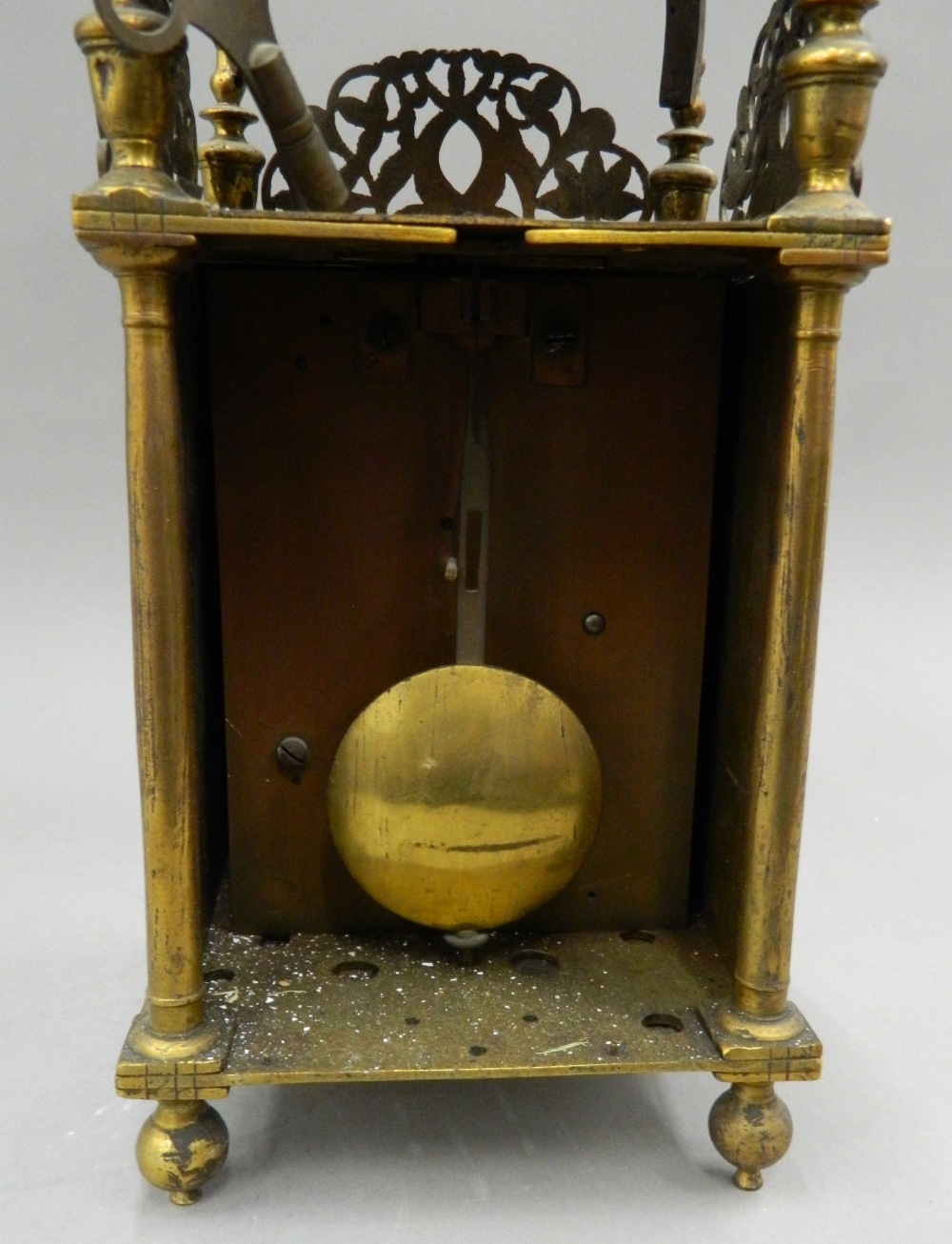 A brass lantern clock The case of typical form with finial mounted top above a bell and circular - Image 3 of 7