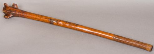 A 19th century Fijian rootstock club "Waka" Of typical form, with carved zigzag patterned handle.