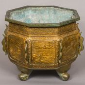 A large 19th century Chinese patinated bronze censer Of octagonal form, with removable liner,