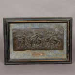 A framed bronzed metal relief plaque In an ebonised velvet lined frame with separate silver plated