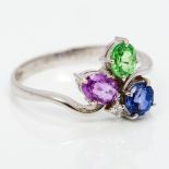 A 14 ct white gold, blue, pink and green sapphire and diamond set ring 1 cm high.