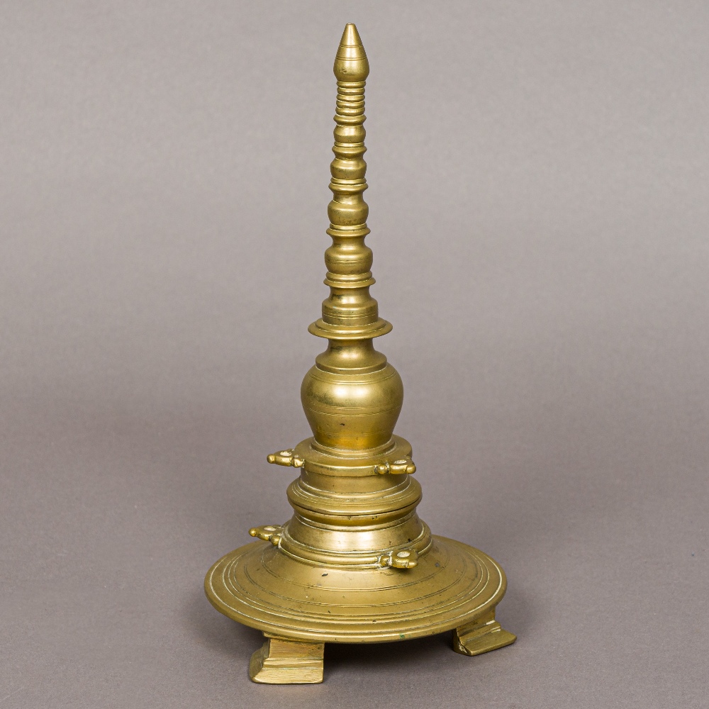 An ornate 19th century Indo-Persian gilt copper bottle vase Together with a brass model of a stupa - Image 2 of 2