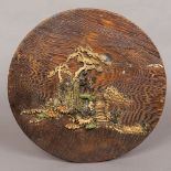 A Japanese Meiji period ivory antler and mother-of-pearl set wooden plaque Of circular form worked