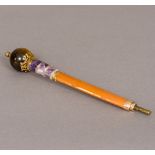 A diamond set gold mounted amethyst and tigers eye parasol handle,