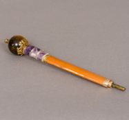 A diamond set gold mounted amethyst and tigers eye parasol handle,