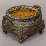 A Japanese Meiji period patinated bronze censer Of twin handled basket weave form. 18 cm wide.