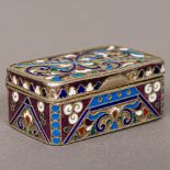 A champleve enamel and silver snuff box Of hinged rectangular form,