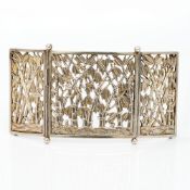 A Chinese unmarked white metal buckle Of three panel form, each with pierced bamboo decoration. 11.