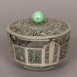 A Chinese unmarked silver mounted facet cut clear glass bowl The removable lid with jade knop