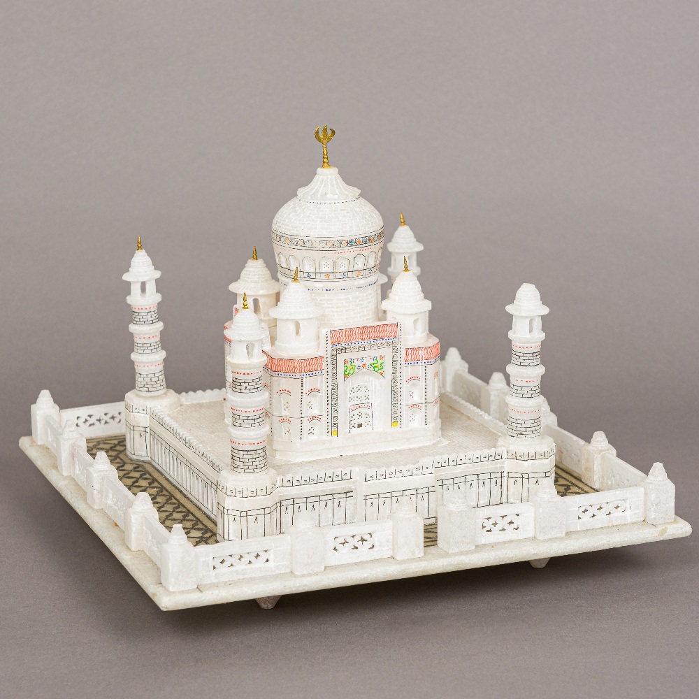 A carved alabaster model of the Taj Mahal 24 cm high.