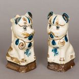 A pair of 19th century Chinese pottery censers Each formed as a cat with blue and brown painted