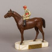 An early 20th century painted spelter model of a horse and jockey Naturalistically modelled,
