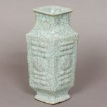 A Chinese, possibly 18th century, crackle glaze vase Of lozenge form, with all over celadon glaze.