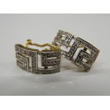 A pair of 18 ct white and yellow gold Greek key earrings. 1.75 cm high (5.5 grammes total weight).