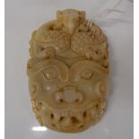 A Chinese white jade buckle. 8 x 5.5 cm.