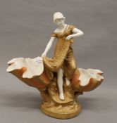 A large Royal Dux figure of a fisher woman. 36.5 cm high.