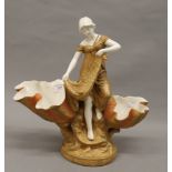 A large Royal Dux figure of a fisher woman. 36.5 cm high.