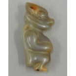 A Chinese jade figure pendant. 7 cm high.