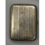 A silver cigarette case. 7 cm wide; 9.5 cm high (87.