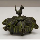 An Indian bronze spice box. 7 cm wide.