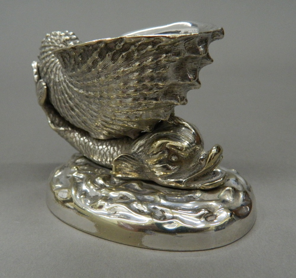 A pair of silver plated dolphin form table salts. 7.5 cm high. - Image 3 of 4