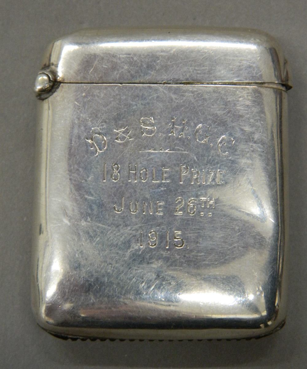 A silver vesta, inscribed D & S HGC, 18 HOLE PRIZE, JUNE 26th 1915. 5.5 cm high (24.7 grammes).