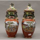 A pair of Masons Ironstone lidded vases. 31.5 cm high.