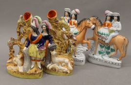 Four Victorian Staffordshire porcelain flatback figures. The largest 21.5 cm high.