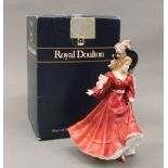 A boxed Royal Doulton porcelain figurine, Patricia HN3365. 23 cm high.