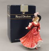 A boxed Royal Doulton porcelain figurine, Patricia HN3365. 23 cm high.