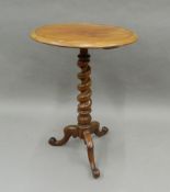 A Victorian mahogany barley twist tripod table. 47 cm diameter.